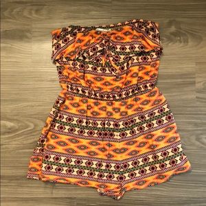 Orange patterned Romper.